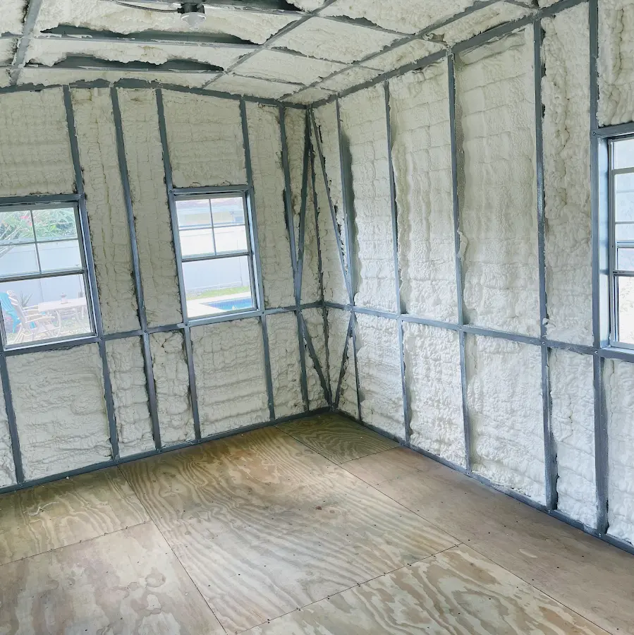 Closed-cell spray foam insulation applied to wall cavities in a residential project in Selah